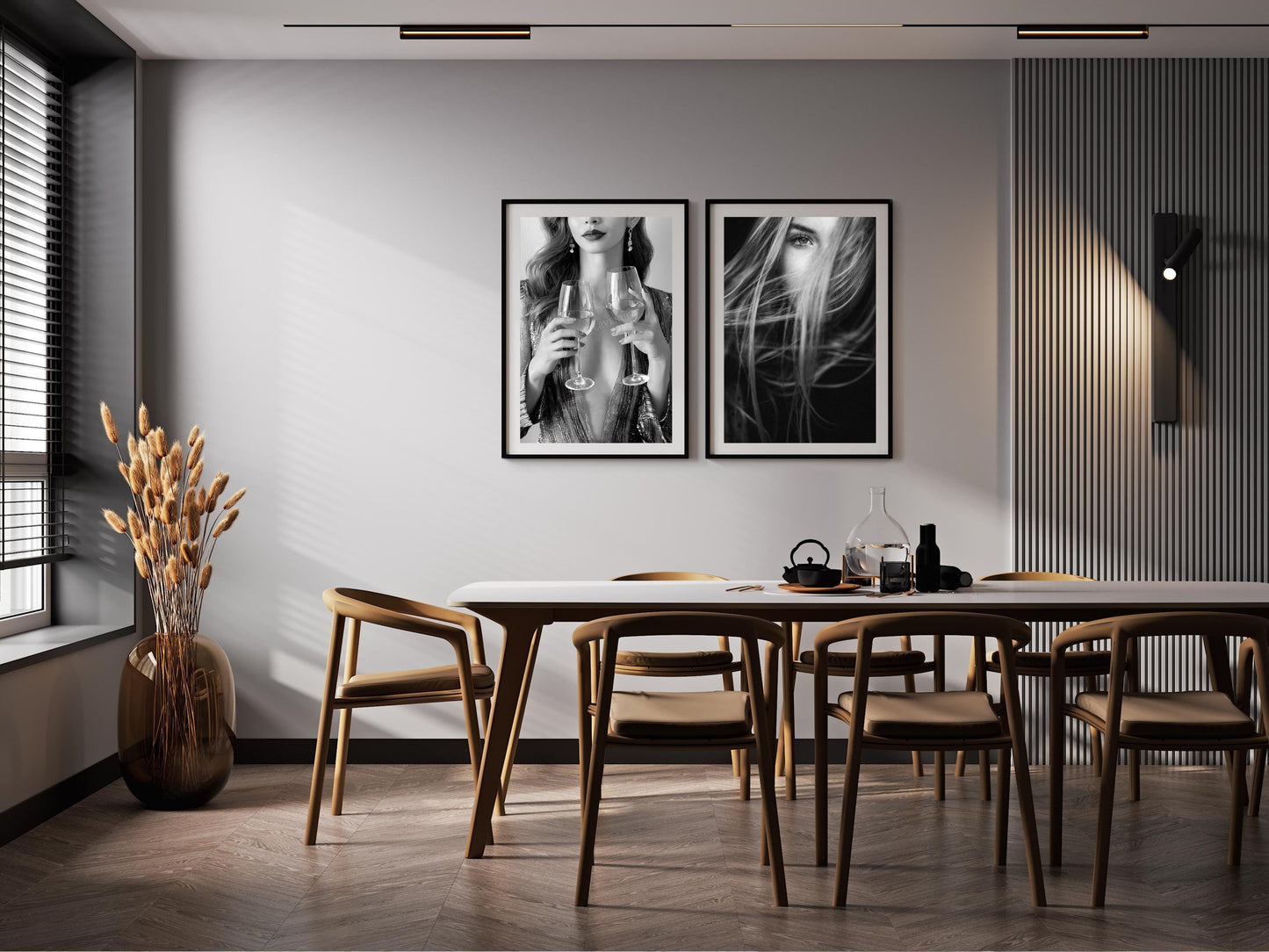 Dining room with wooden table and chairs, black and white wall art, and decorative elements.