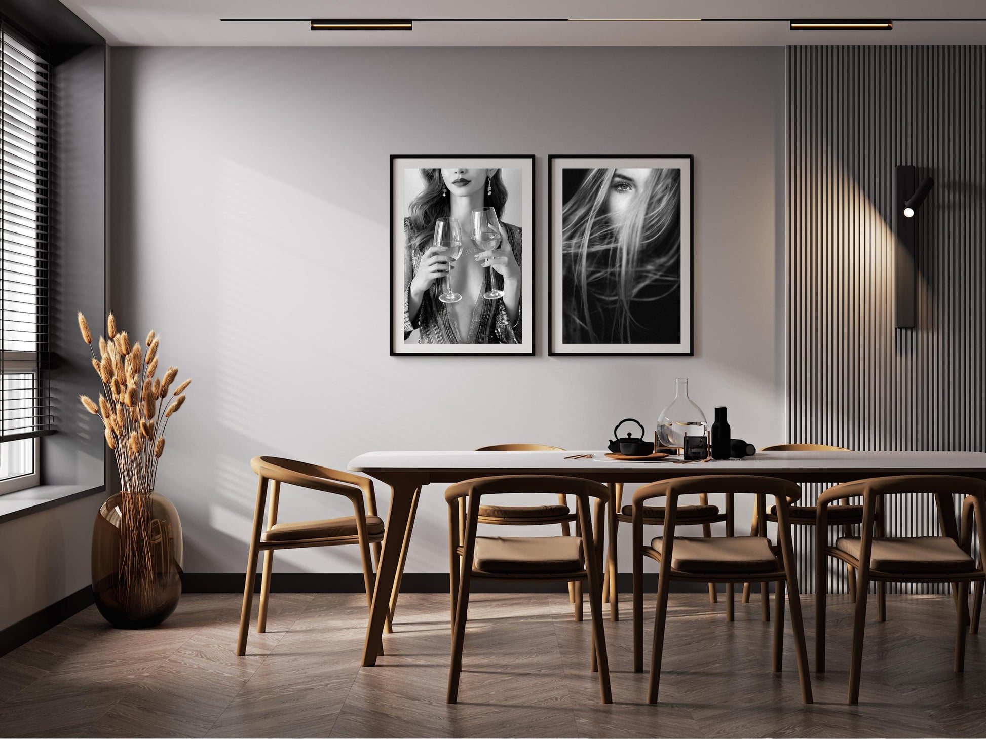 Dining room with wooden table and chairs, black and white wall art, and decorative elements.