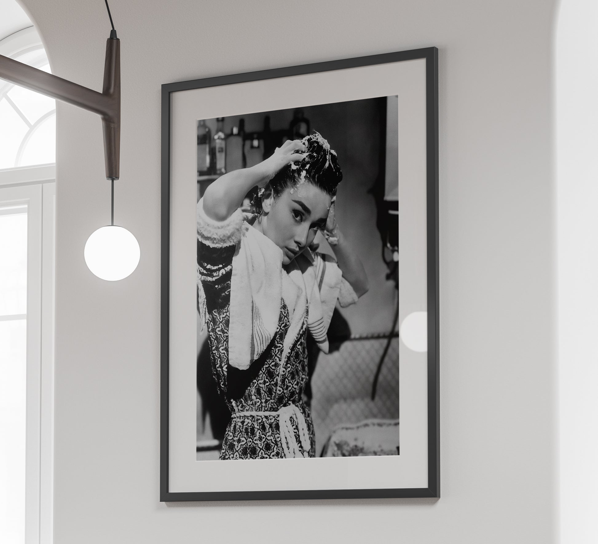 Stylish black and white Audrey Hepburn print washing her hair, blending vintage photography with classic Old Hollywood charm. Perfect bathroom wall art, available as a digital download.