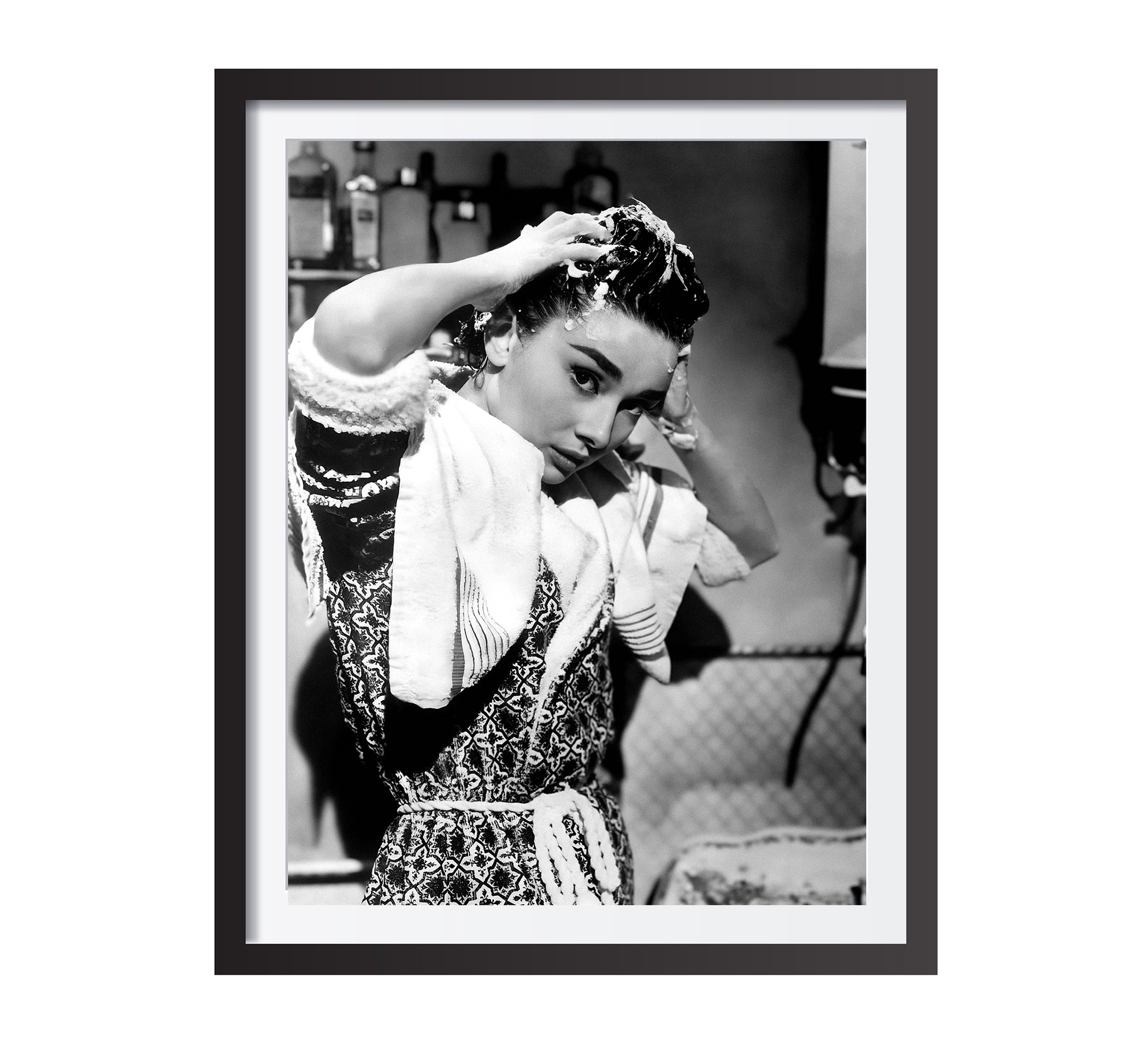 Stylish black and white Audrey Hepburn print washing her hair, blending vintage photography with classic Old Hollywood charm. Perfect bathroom wall art, available as a digital download.