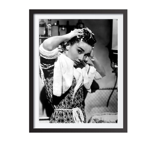 Stylish black and white Audrey Hepburn print washing her hair, blending vintage photography with classic Old Hollywood charm. Perfect bathroom wall art, available as a digital download.