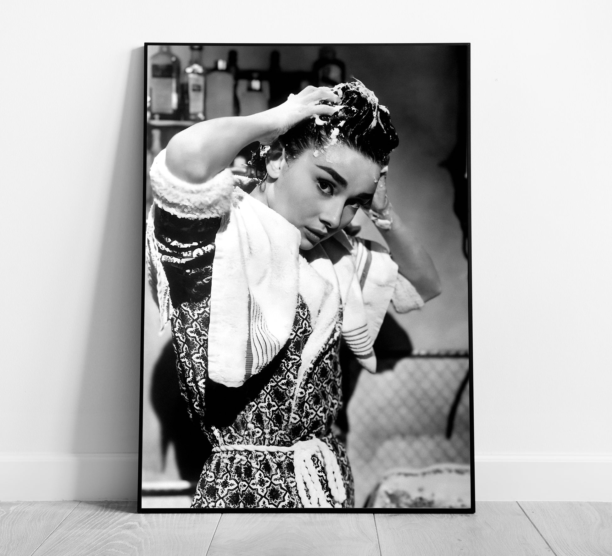 Stylish black and white Audrey Hepburn print washing her hair, blending vintage photography with classic Old Hollywood charm. Perfect bathroom wall art, available as a digital download.